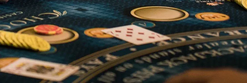 Live casino dealer at a gaming table